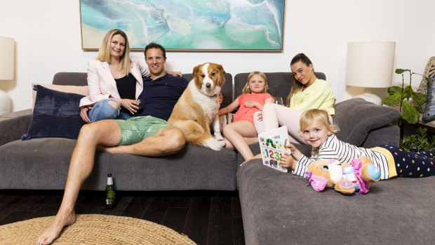 "The noise, chaos and laughter fills the space": The Smith family, au pair Charli Slarks and dog Sundae.