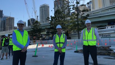 Destination Brisbane project director Simon Crooks, Probuild managing director Jeff Wellburn and Star Casino’s Geoff Hogg walk through the concrete base of The Landing, which will become two landscaped parklands reaching 50 metres out into the Brisbane River.