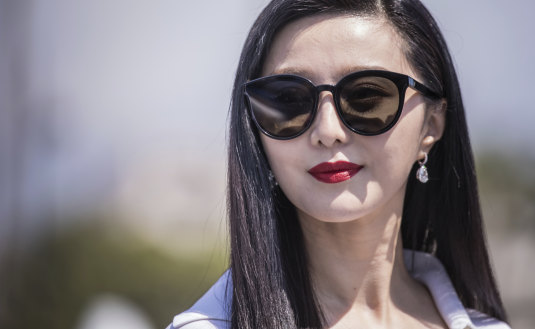 Fan BingBing poses for photographers during a photo call for the film '355' in Cannes in May.