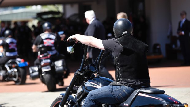 Rebels members arrive to the funeral home to farewell slain bikie boss Nick Martin