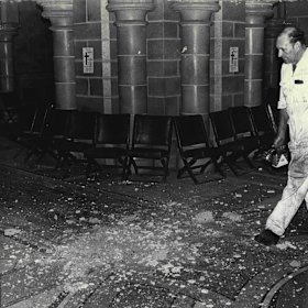 Sergeant Bill Fahey on the crypt floor after a bomb exploded at St Mary’s Cathedral in 1973.
