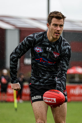 Zach Merrett is embracing different outlooks in his role as Essendon skipper.