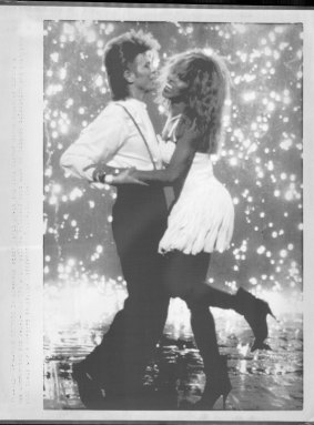 David Bowie and Tina Turner dance together during a new commercial for Pepsi in the USA in 1987.