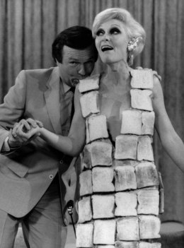 Jeanne Little in a dress made of toast.