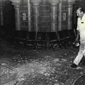 Sergeant Bill Fahey on the crypt floor after a bomb exploded at St Mary’s Cathedral in 1973.
