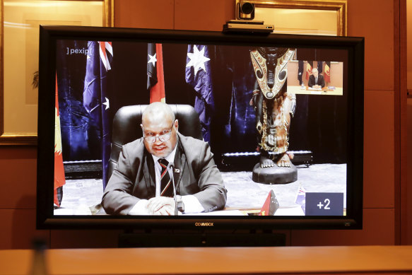 Papua New Guinea Prime Minister James Marape seen on the screen during a virtual summit with Prime Minister Scott Morrison last week.