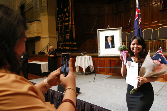 Kezia Sujana poses for a photo after receiving her citizenship at the Melbourne Town Hall on January 26, 2023.