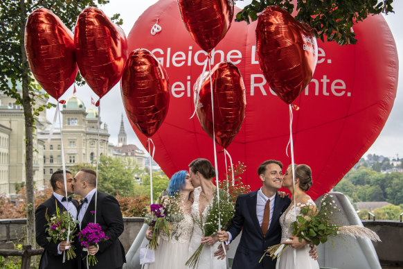 Operation Libero stages a photo opportunity of a marriage with three different couples, in Bern, Sunday, September 26, 2021.
