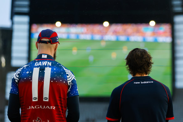 Max Gawn and another Melbourne player took in the Matildas action pre-match.