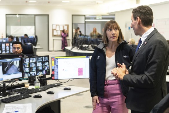 Transport Minister Jo Haylen and Metro Trains Sydney chief executive Daniel Williams in the operations control centre.