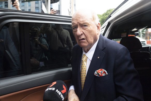 Alan Jones arrives at court in his white BMW.