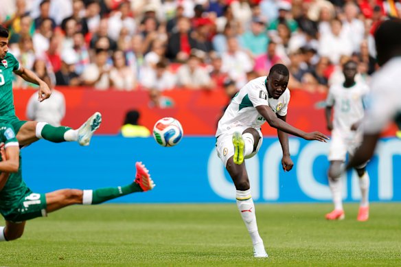 Papa Gueye produces his moment of magic for Senegal in Toronto.
