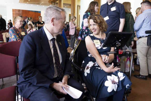 Minister for the National Disability Insurance Scheme Bill Shorten with disability advocate Gretta Serov during a morning tea to mark the International Day of People with Disability last week.