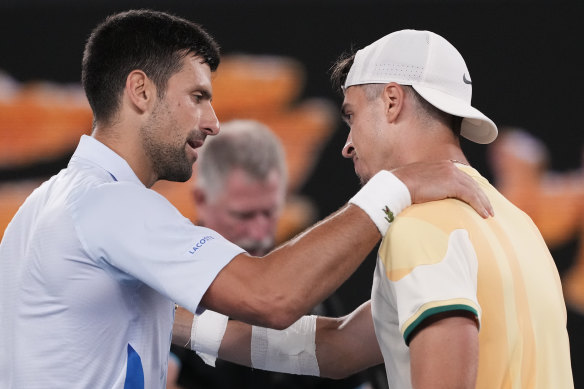 Serbia’s Novak Djokovic, left, is congratulated by Croatia’s Dino Prizmic.