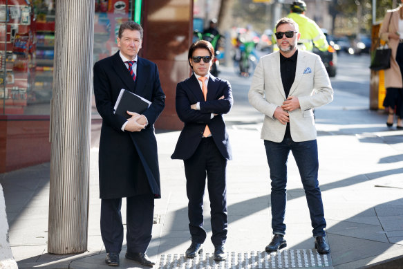 Fadi Ibrahim, centre, outside court before the hearing.