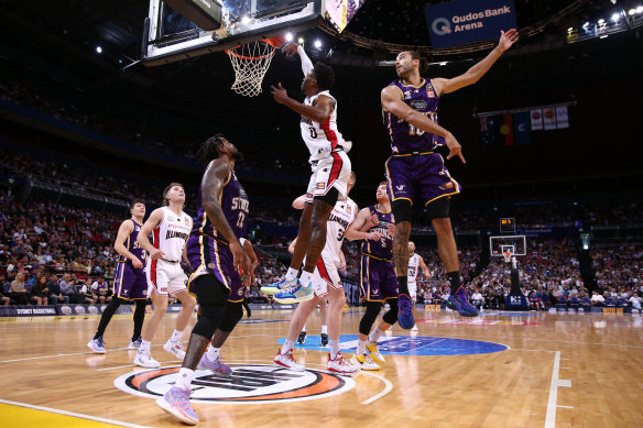 Antonius Cleveland drives to the ring for the Hawks.