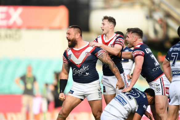 Roosters enforcer Jared Waerea-Hargreaves celebrates his try against the Cowboys.