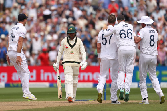 Usman Khawaja being sent off by Ollie Robinson.