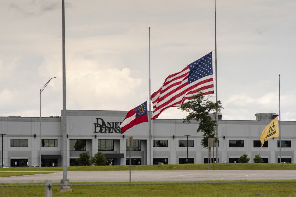 A flag flies at half-mast at Daniel Defense’s headquarters in Black Creek, Georgia, on May 27, after one of its guns was used in the Uvalde school massacre.