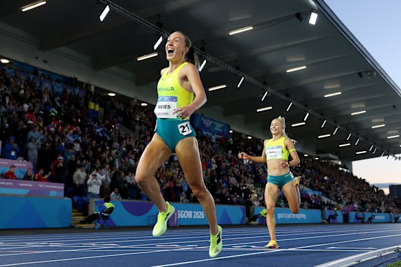 Rose Davies celebrates as she wins gold in the 5000m.