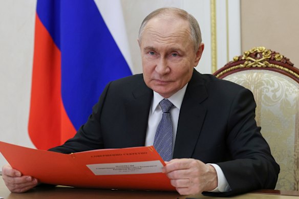 Russian President Vladimir Putin works at the Kremlin late last week.