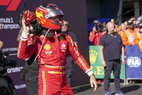 Carlos Sainz heads to the fans.