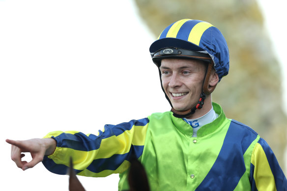 Dylan Gibbons celebrates his Tancred Stakes win on Kalapour.