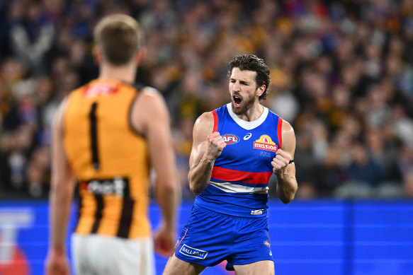 Marcus Bontempelli of the Bulldogs celebrates kicking a goal.