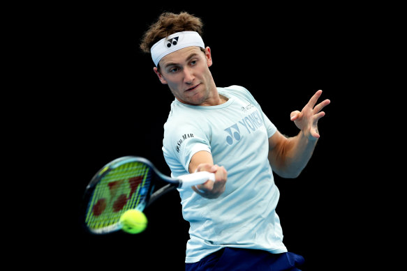 Norwegian tennis player Casper Ruud practices on court in Sydney.