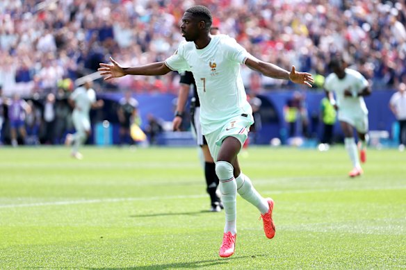 Dembele celebrates his goal against Norway.