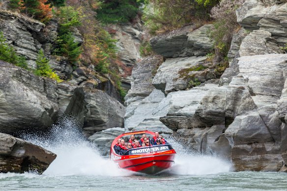 Riding the Shotover Jet boat near Queenstown.