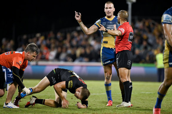 Panthers trainer Pete Green attends to Mitch Kenny during last year’s finals series - a moment which cost him his spot in the next two games.