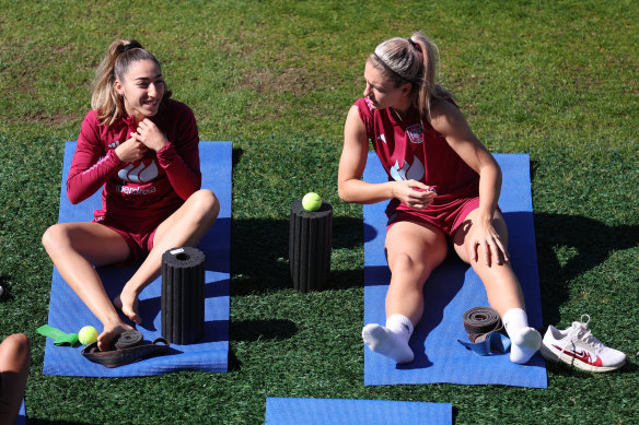 Olga Carmona and Alexia Putellas warm up at Leichhardt Oval during the week.
