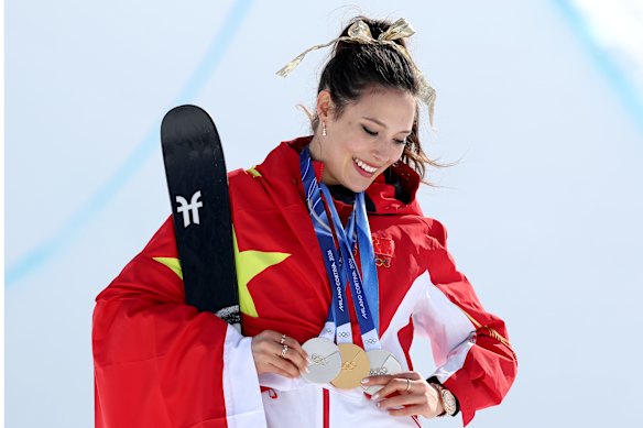 Eileen Gu with her Olympic gold medal.