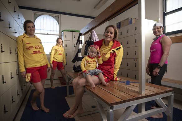 Bondi Surf Life Saving Club members (from left) Claudia Frontini, Rose MacMahon, Geraldine Baldock with Ethan, and Rozanne Green. 
