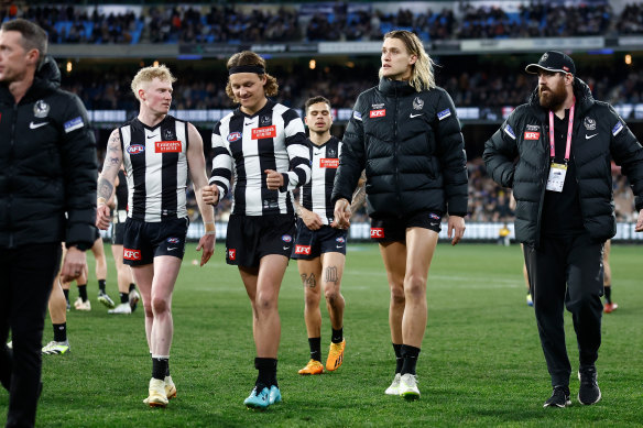 Forlorn: Darcy Moore after being substituted.