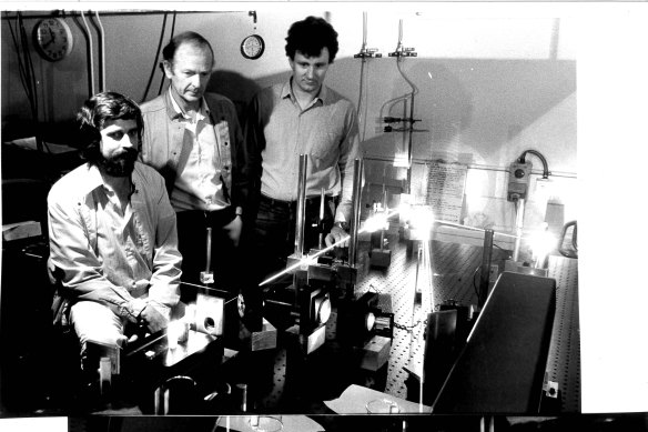 Robert Armstrong (centre) laser chemist was a pioneer in investigation into haemoglobin.