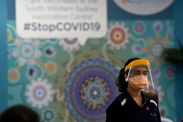 A healthcare worker at the South Western Sydney Vaccination Centre.