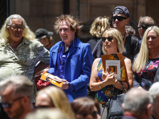 Colin Burgess (centre) from The Masters Apprentices outside St Andrew’s Cathedral after the funeral service of Stevie Wright in Sydney, 2016.
