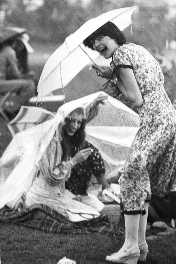 It took more than a rainstorm to dampen spirits at parties on the lawns at Flemington for the 1976 Melbourne Cup.