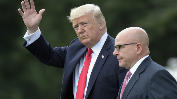 Donald Trump waves as he walks with National Security Adviser HR McMaster whom he is reportedly wanting to fire. 