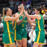 Tess Madgen, Cayla George and Jade Melbourne celebrate the Opals’ win over Japan.
