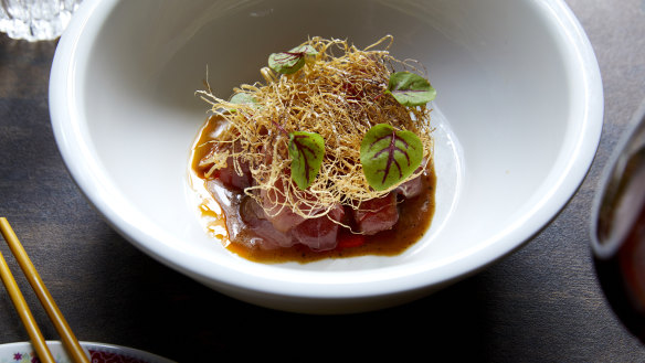 Bluefin tuna with black pepper and citrus oil.