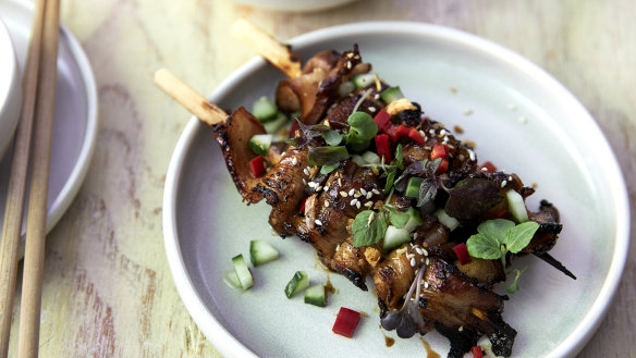 Glazed pork belly skewers.