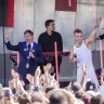 Melbourne Lord Mayor Nick Reece with Robbie Williams to give him the key to the city at Federation Square. 