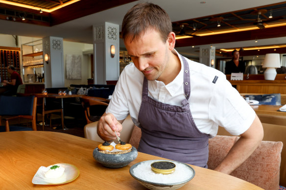 Bathers’ Pavilion chef Aaron Ward tops his potato scallops with caviar.