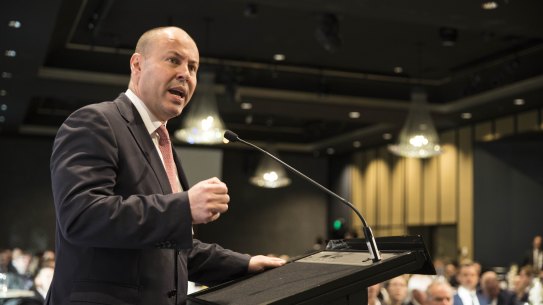 Josh Frydenberg selling the 2021-22 budget in May last year. The national interest bill could head towards $30 billion as global interest rates climb.