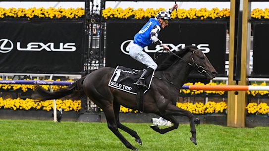 Mark Zahra celebrates past the post.