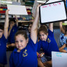 Year 1 students at Oatley Public School use their knowledge of phonics to spell on their whiteboards.