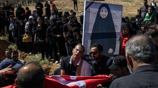 Mourners at the funeral for Fatima Abdullah, the 9-year-old girl among those killed in the pager attack, in the village of Saraain El Faouqa, Lebanon.